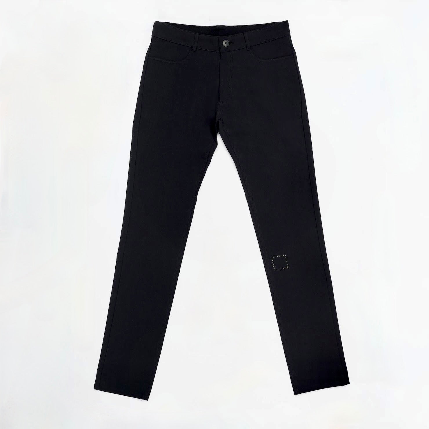 Flat lay of The Pants by åäö in Tech Black on a white background