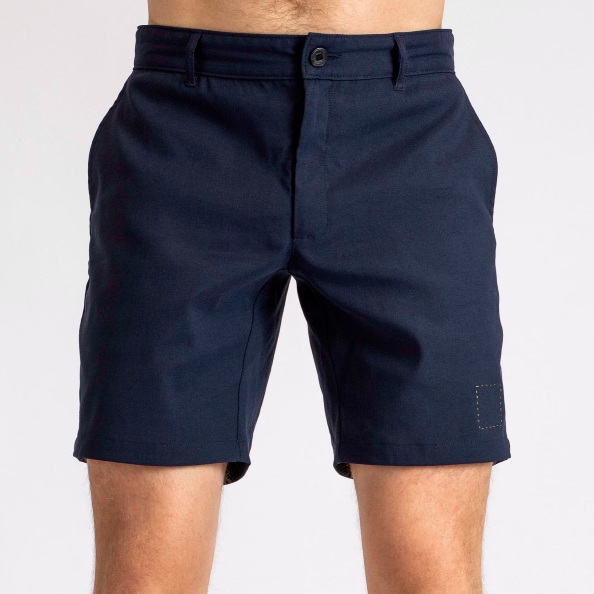 Front view of a man in åäö’s Shorts in Deep Blue, showcasing their timeless design and perfected fit.