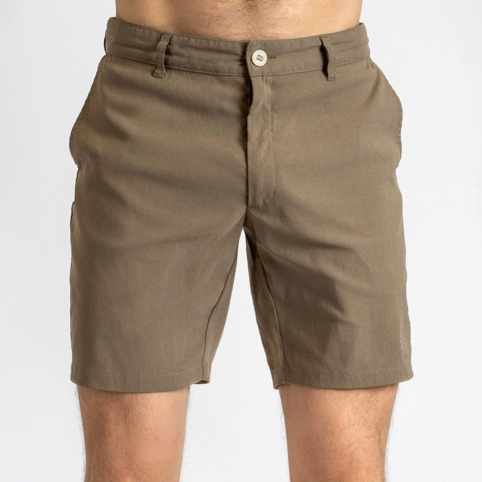 Front view of a man in åäö’s Shorts in Dusty Desert, showcasing their timeless design and perfected fit.