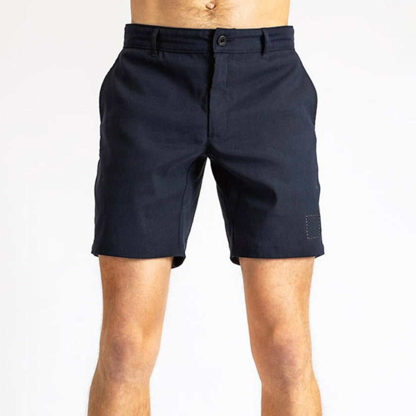 Front view of a man in åäö’s Shorts in Deep Blue, showcasing their timeless design and perfected fit.