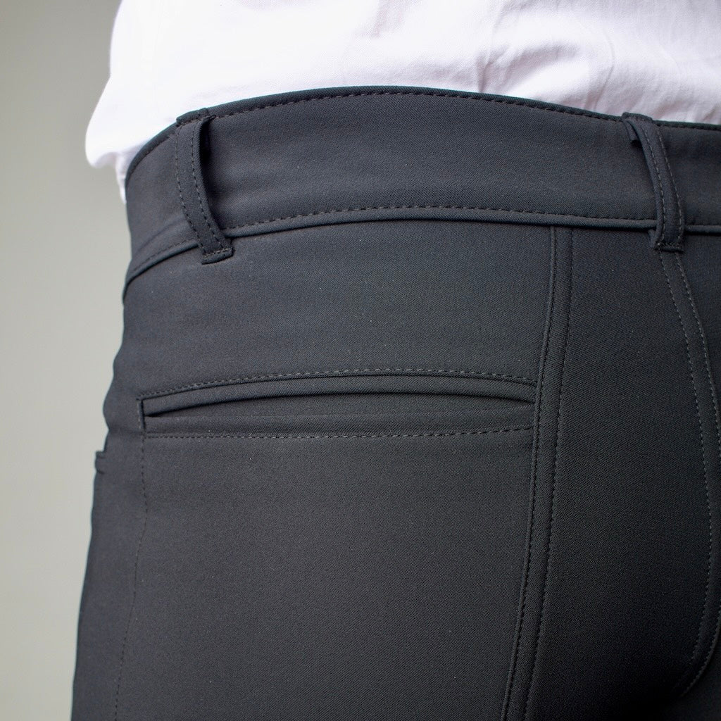 Close-up of the back of The Pants by åäö in Blue Black, featuring double-piped pockets for design and durability