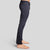 Side view of a man in The Pants by åäö in Pigeon Perfect Grey, showcasing their sleek fit and timeless design.