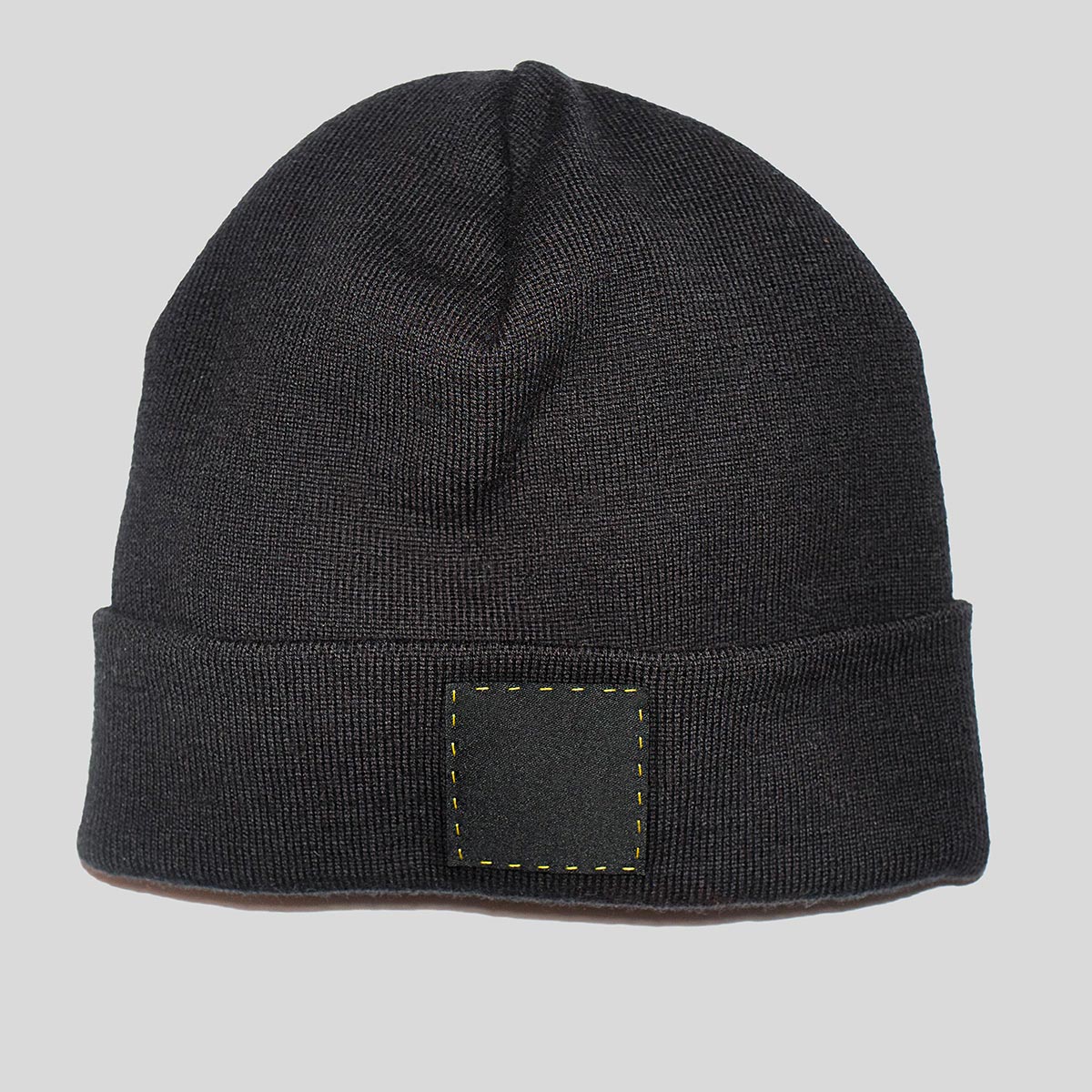 Flatlay of The Beanie by åäö, showcasing its meticulous stitching and crafted design.